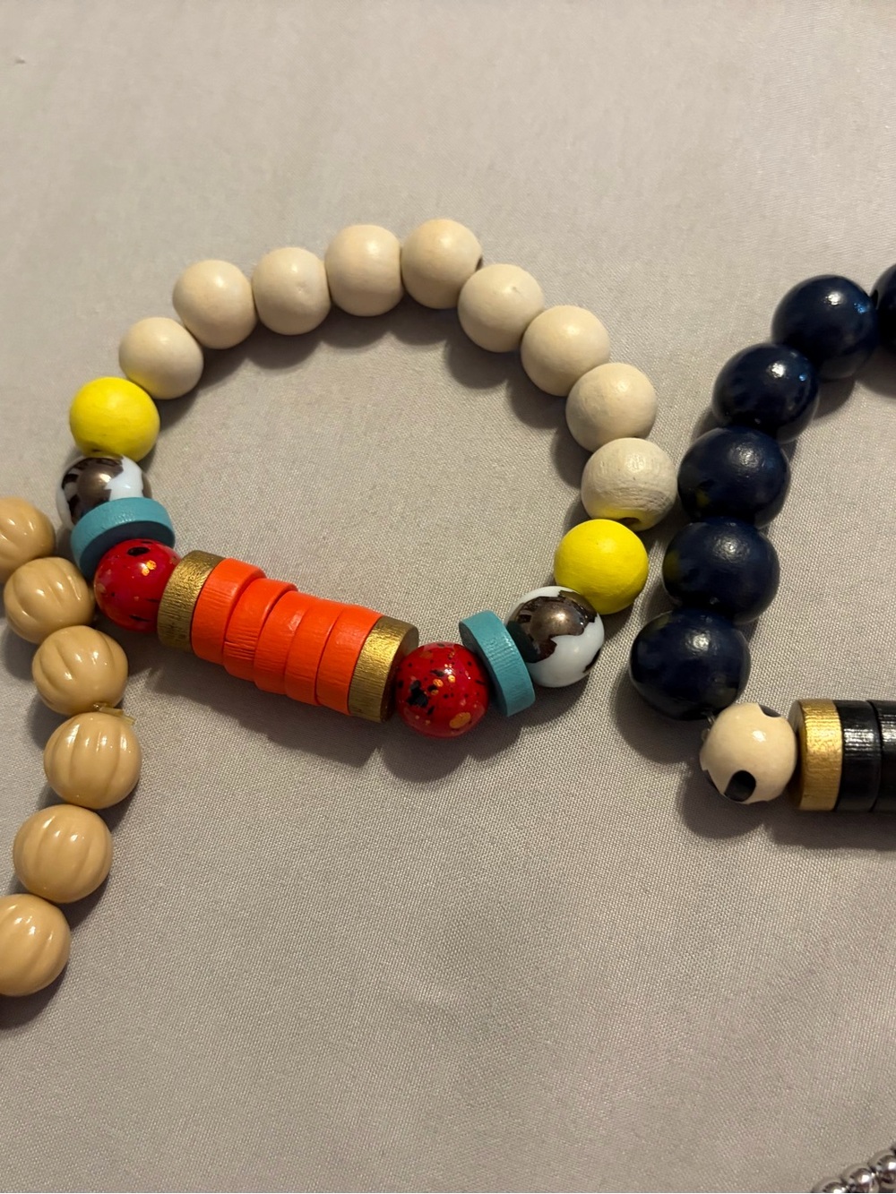 Plunder Beaded Stretch Bracelet in Cream, Yellow, Orange and Blue